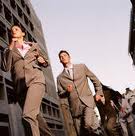 men in suits running